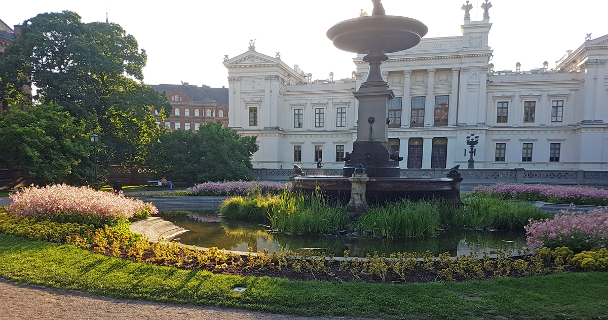 The University Plaza in Lund with the plaque showing “the meridian of the academic quarter hour”