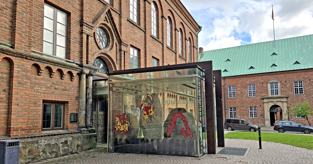 The runestones from the Hunnestad Monument in the glazed entrance to the Swedish History Museum in Lund
